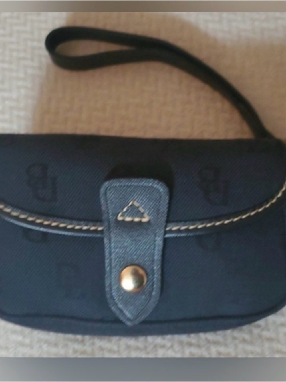 Dooney and Bourke Navy Blue Wristlet Clutch with Monogram Accent